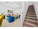 Modern staircase leading to the upper level of the home at 17399 Nectar Flume Dr, Land O Lakes, FL 34638