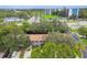 Aerial view of townhouses close to a main road at 1213 Abbey Crescent Ln, Clearwater, FL 33759