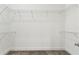 Spacious walk-in closet with wire shelving for optimal storage and organization at 1650 Fallon Pass, Zephyrhills, FL 33541