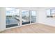 Living room with water views and sliding glass doors at 2 Adalia Ave # 708, Tampa, FL 33606