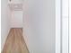 White hallway with light wood flooring at 2 Adalia Ave # 708, Tampa, FL 33606