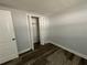 Spacious bedroom with wood-look floors and built-in closet at 1024 Jadewood Ave, Clearwater, FL 33759