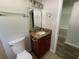 Updated bathroom with granite vanity and modern fixtures at 1024 Jadewood Ave, Clearwater, FL 33759