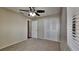 Bedroom with double door closet and neutral wall color at 6969 Oldgate Cir, New Port Richey, FL 34655