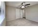 Spacious bedroom with double door closet and neutral wall color at 6969 Oldgate Cir, New Port Richey, FL 34655