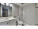 Updated bathroom with white subway tile shower and vanity at 6969 Oldgate Cir, New Port Richey, FL 34655