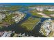 Stunning aerial showcasing waterfront property and canal access at 5006 Sand Castle Dr, New Port Richey, FL 34652