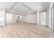 Spacious and bright living room with wood flooring and recessed lighting at 22426 Golden Retriever Ln, Brooksville, FL 34601
