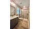 Clean bathroom with a glass-enclosed shower, modern vanity, and updated fixtures at 4000 Southern Valley Loop, Brooksville, FL 34601