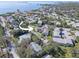 Aerial view highlighting the location of a property near a community pool and waterfront access at 428 Windrush Bay Dr, Tarpon Springs, FL 34689