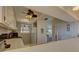 Well-organized kitchen with white cabinets and modern appliances, offering a functional cooking space at 428 Windrush Bay Dr, Tarpon Springs, FL 34689