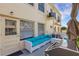 Outdoor patio area with seating and grill at 2298 Netherlands Dr # 4, Clearwater, FL 33763