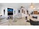 Open living room, dining, and kitchen area at 2298 Netherlands Dr # 4, Clearwater, FL 33763