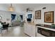 Open concept kitchen and living area with breakfast bar and comfortable seating at 2298 Netherlands Dr # 4, Clearwater, FL 33763