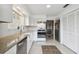 Bright kitchen with stainless steel appliances and granite countertops at 4028 Davit Dr # 4028, New Port Richey, FL 34652