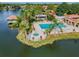Resort-style pool and spa overlooking a tranquil lake at 4028 Davit Dr # 4028, New Port Richey, FL 34652
