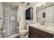 Clean bathroom with shower, toilet and vanity at 4028 Davit Dr # 4028, New Port Richey, FL 34652