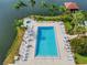 Relaxing pool area with plenty of lounge chairs at 4028 Davit Dr # 4028, New Port Richey, FL 34652