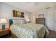 Bedroom with a floral comforter and nightstands at 4028 Davit Dr # 4028, New Port Richey, FL 34652