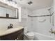 Updated bathroom with a tub, shower, and modern vanity at 4028 Davit Dr # 4028, New Port Richey, FL 34652