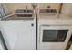 Convenient laundry room with matching washer and dryer at 4028 Davit Dr # 4028, New Port Richey, FL 34652