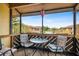 Cozy screened patio with table and chairs, overlooking the community at 4028 Davit Dr # 4028, New Port Richey, FL 34652