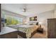 Bedroom with a floral comforter and ceiling fan at 4028 Davit Dr # 4028, New Port Richey, FL 34652