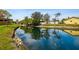 Peaceful waterfront view with a canal and lush landscaping at 4028 Davit Dr # 4028, New Port Richey, FL 34652