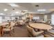 Spacious community room with tables and chairs, perfect for gatherings at 4028 Davit Dr # 4028, New Port Richey, FL 34652