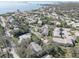 Aerial view of waterfront community with many homes at 428 Windrush Bay Dr, Tarpon Springs, FL 34689