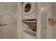 Stacked washer and dryer in a laundry closet at 428 Windrush Bay Dr, Tarpon Springs, FL 34689