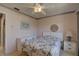 Bedroom with a full-size bed and window at 428 Windrush Bay Dr, Tarpon Springs, FL 34689