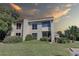 Two-story condo with landscaped yard at 428 Windrush Bay Dr, Tarpon Springs, FL 34689