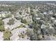 Wide aerial view of a neighborhood near the coast at 428 Windrush Bay Dr, Tarpon Springs, FL 34689