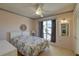 Bedroom with a full-size bed and window at 428 Windrush Bay Dr, Tarpon Springs, FL 34689