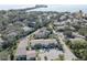 Aerial view of waterfront community with many homes at 428 Windrush Bay Dr, Tarpon Springs, FL 34689