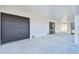 Spacious covered exterior showcasing a modern design with a large garage door and clean lines for a contemporary aesthetic at 2832 W Vina Del Mar Blvd, St Pete Beach, FL 33706