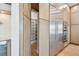 Gourmet kitchen with a large pantry, stainless steel refrigerator, and modern appliances at 2832 W Vina Del Mar Blvd, St Pete Beach, FL 33706