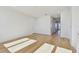 Sun-filled living room featuring hardwood floors and neutral walls at 2832 W Vina Del Mar Blvd, St Pete Beach, FL 33706