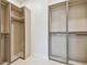 Spacious walk-in closet with custom shelving and ample storage space at 2832 W Vina Del Mar Blvd, St Pete Beach, FL 33706