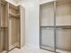 Spacious walk-in closet with custom shelving and ample storage space, designed for organization at 2832 W Vina Del Mar Blvd, St Pete Beach, FL 33706