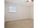 Bright bedroom with window, ceiling fan and carpet at 1960 Union St # 34, Clearwater, FL 33763