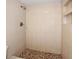 Stand up shower with tiled walls and mosaic floor at 1960 Union St # 34, Clearwater, FL 33763