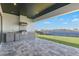 Outdoor kitchen with granite countertops and water views at 1810 4Th E St, Palmetto, FL 34221