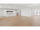 Spacious living area with hardwood floors, open concept kitchen, and high ceilings at 1810 4Th E St, Palmetto, FL 34221