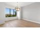 Bright dining room with hardwood floors and water views at 1810 4Th E St, Palmetto, FL 34221