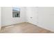 Bright bedroom with hardwood floors and a window at 1810 4Th E St, Palmetto, FL 34221