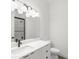 Clean bathroom with white vanity, marble countertop, and toilet at 1810 4Th E St, Palmetto, FL 34221