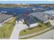 Aerial view of a waterfront home with a dark gray roof at 1810 4Th E St, Palmetto, FL 34221