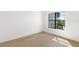 Spacious bedroom featuring hardwood floors and a large window at 1810 4Th E St, Palmetto, FL 34221